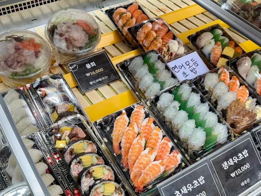 Sushi menu items priced in the low ₩10,000s
