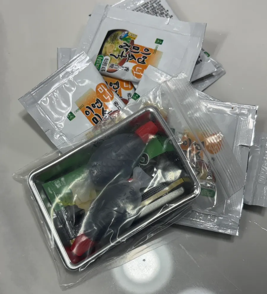 Miso soup, soy sauce, and wasabi packed together