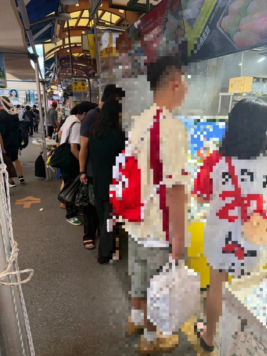 Customers lined up to order at the busy shop