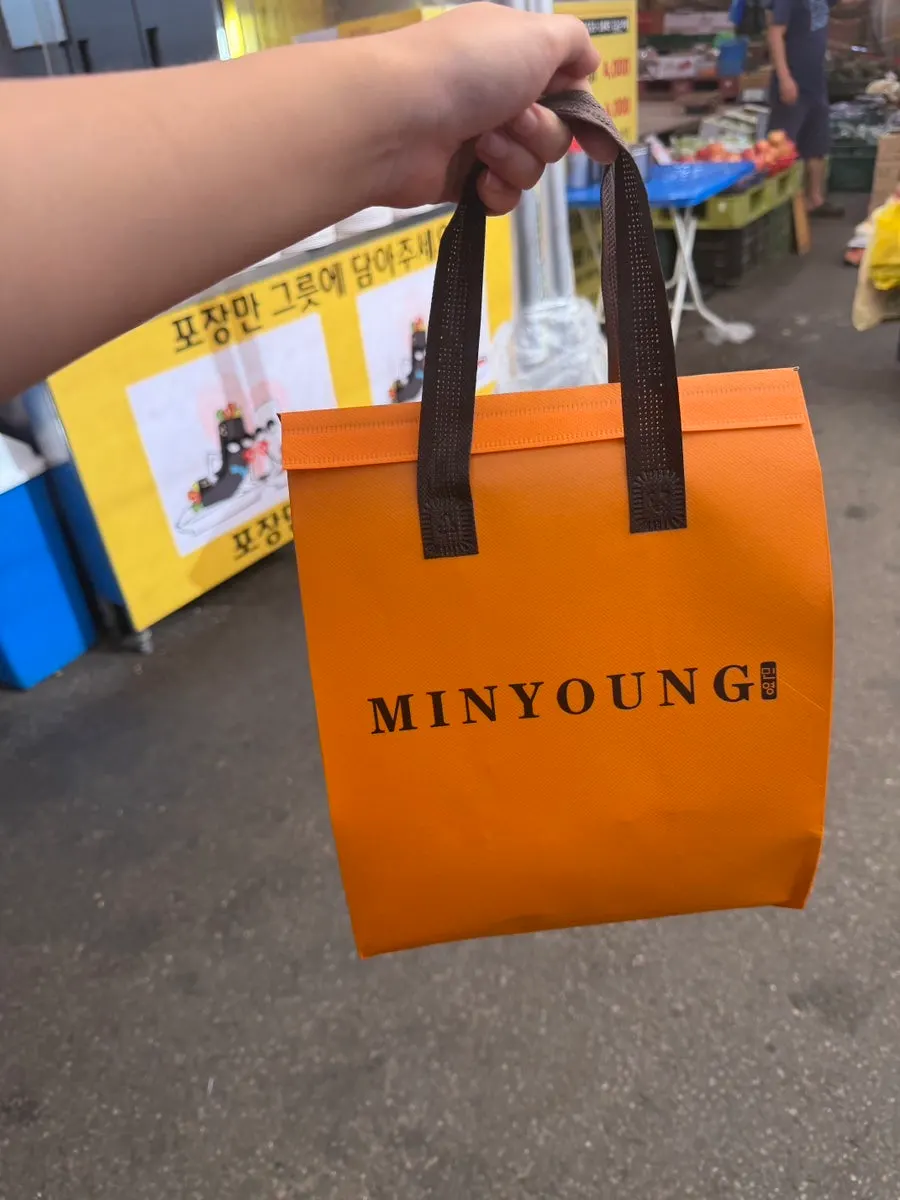 Sushi packed in an orange cold bag