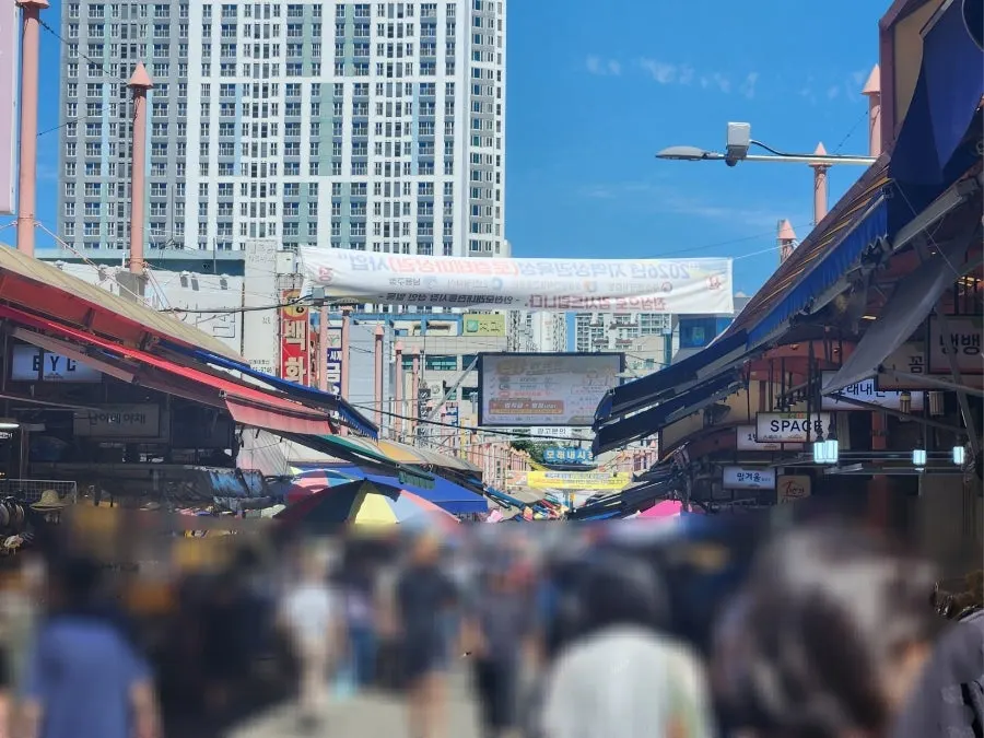 Crowded weekend street at Moraenae Market in Guwol-dong, Incheon