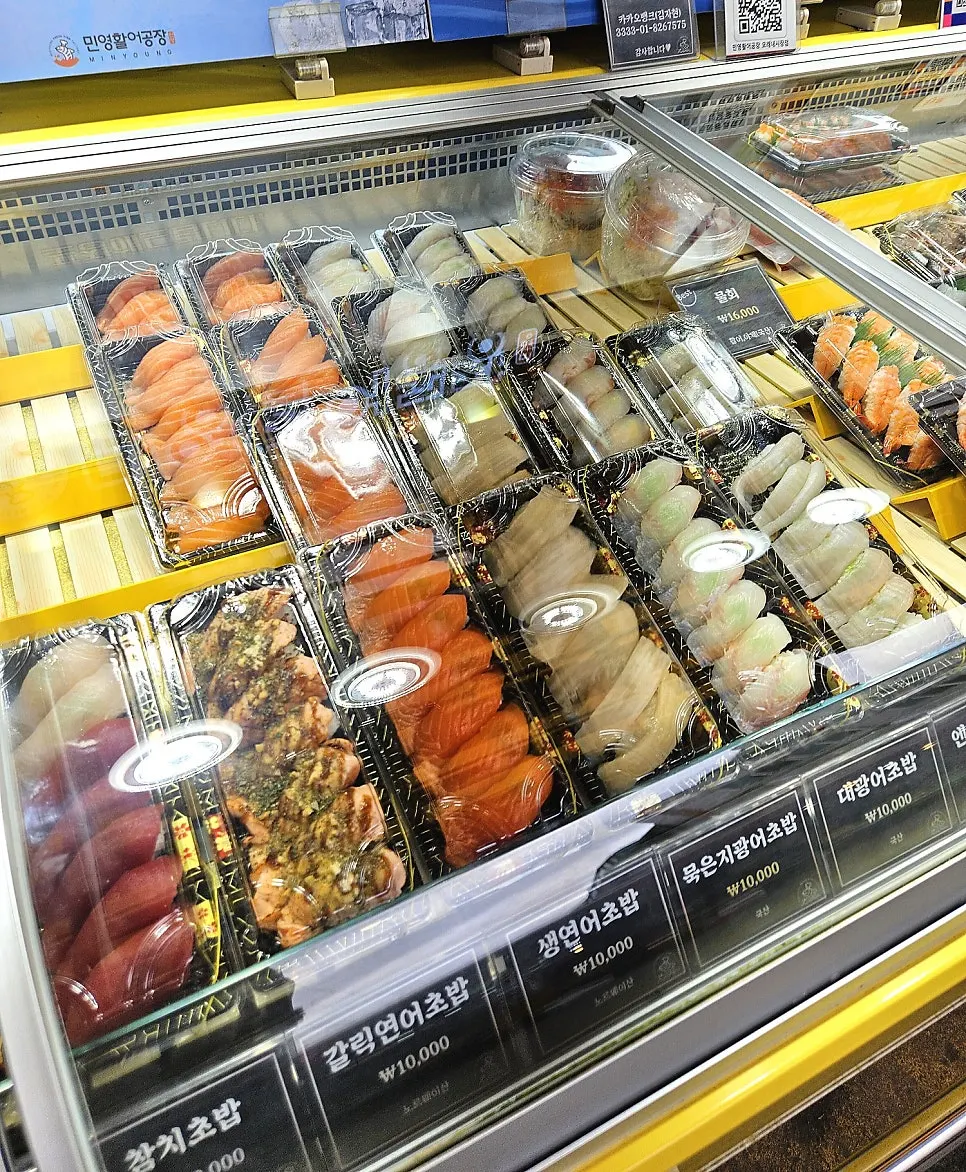 Menu board for garlic salmon sushi and engawa sushi