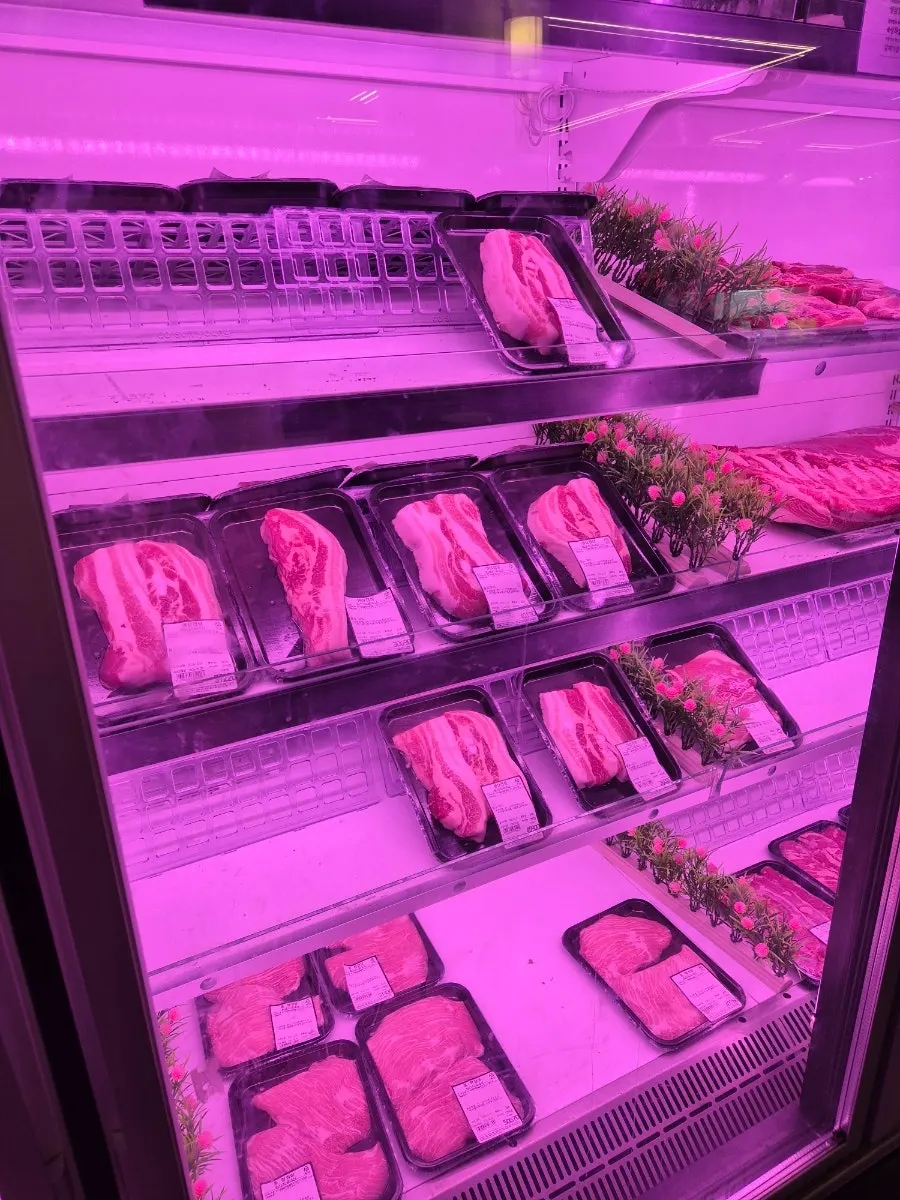 Pre-portioned meat in the butcher display fridge