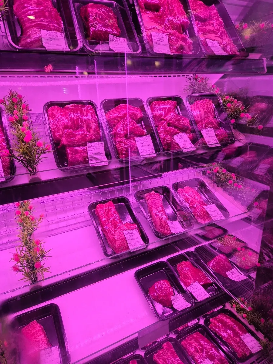 Display case of pork, beef and lamb cuts