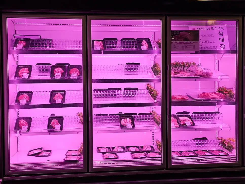 Large meat showcase facing the entrance