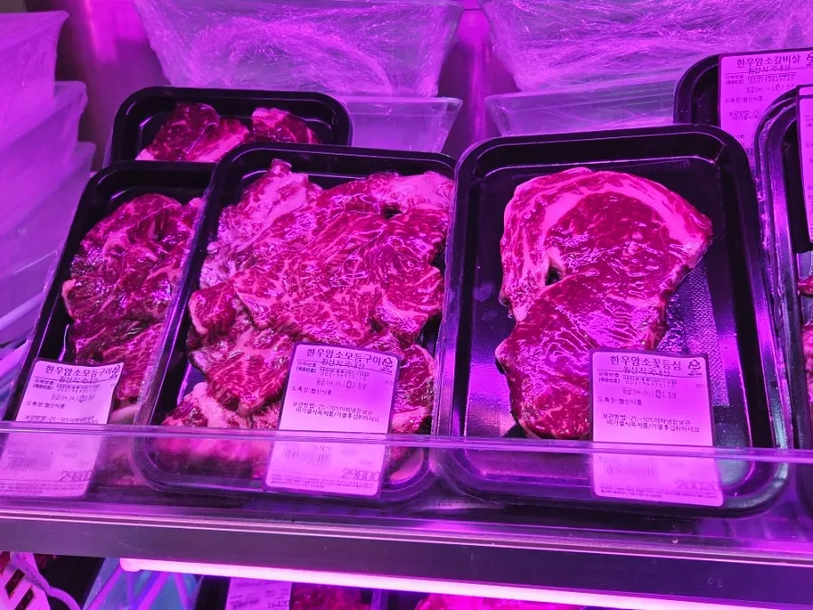 Display of single-portion hanwoo assorted grill sets and flower sirloin