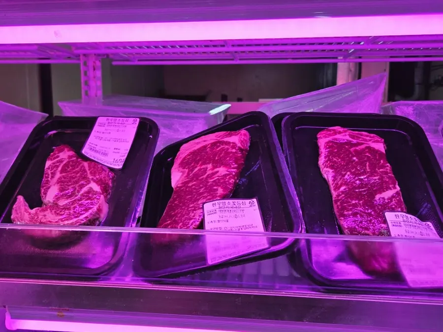 Beef packaged in single-serving portions on display