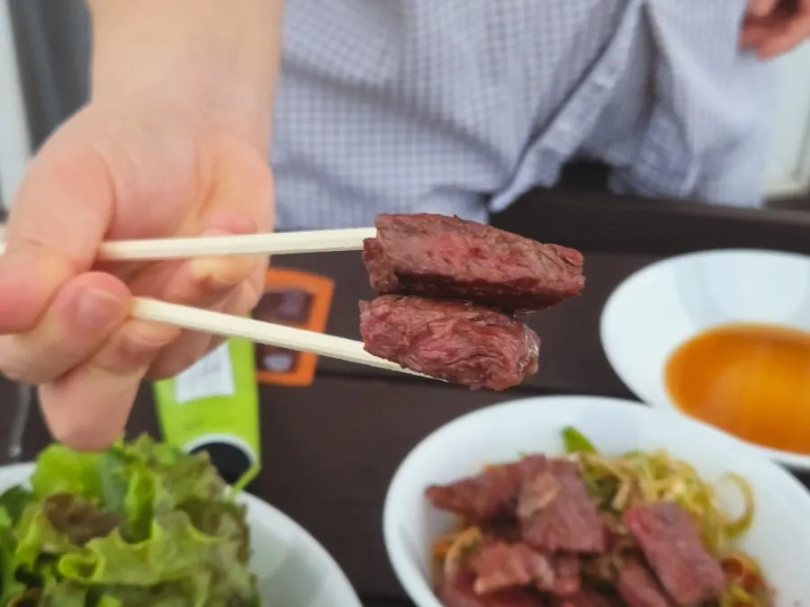 Hanwoo cow flower sirloin grilling over charcoal
