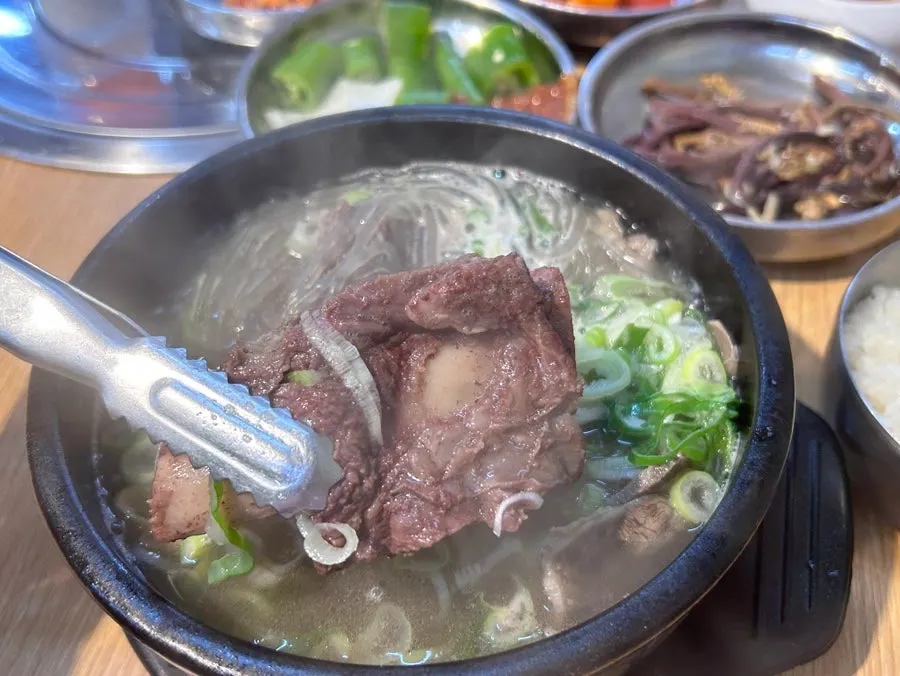 Rib meat pulled off the bone with chopsticks