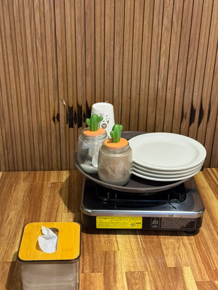 Table set with small plates and condiments