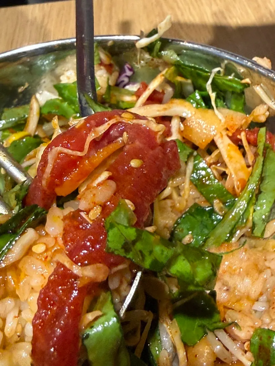 Yukhoe bibimbap mixed with the sauce