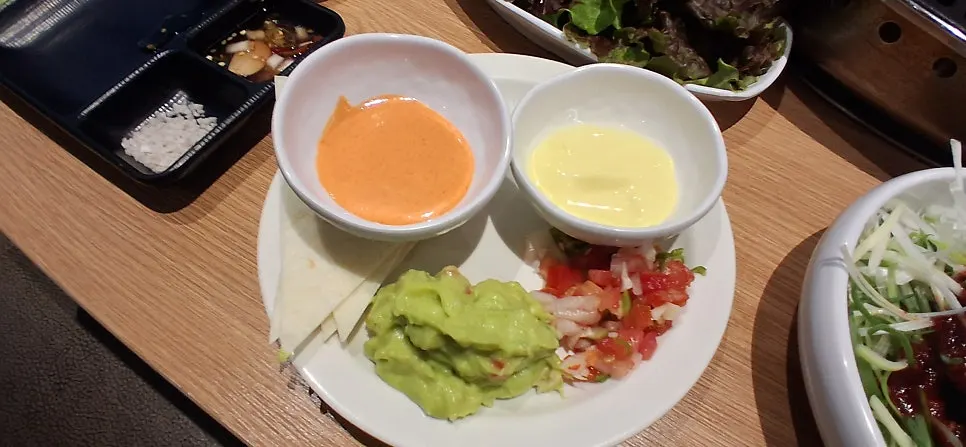 Meat taco on a tortilla with sauces