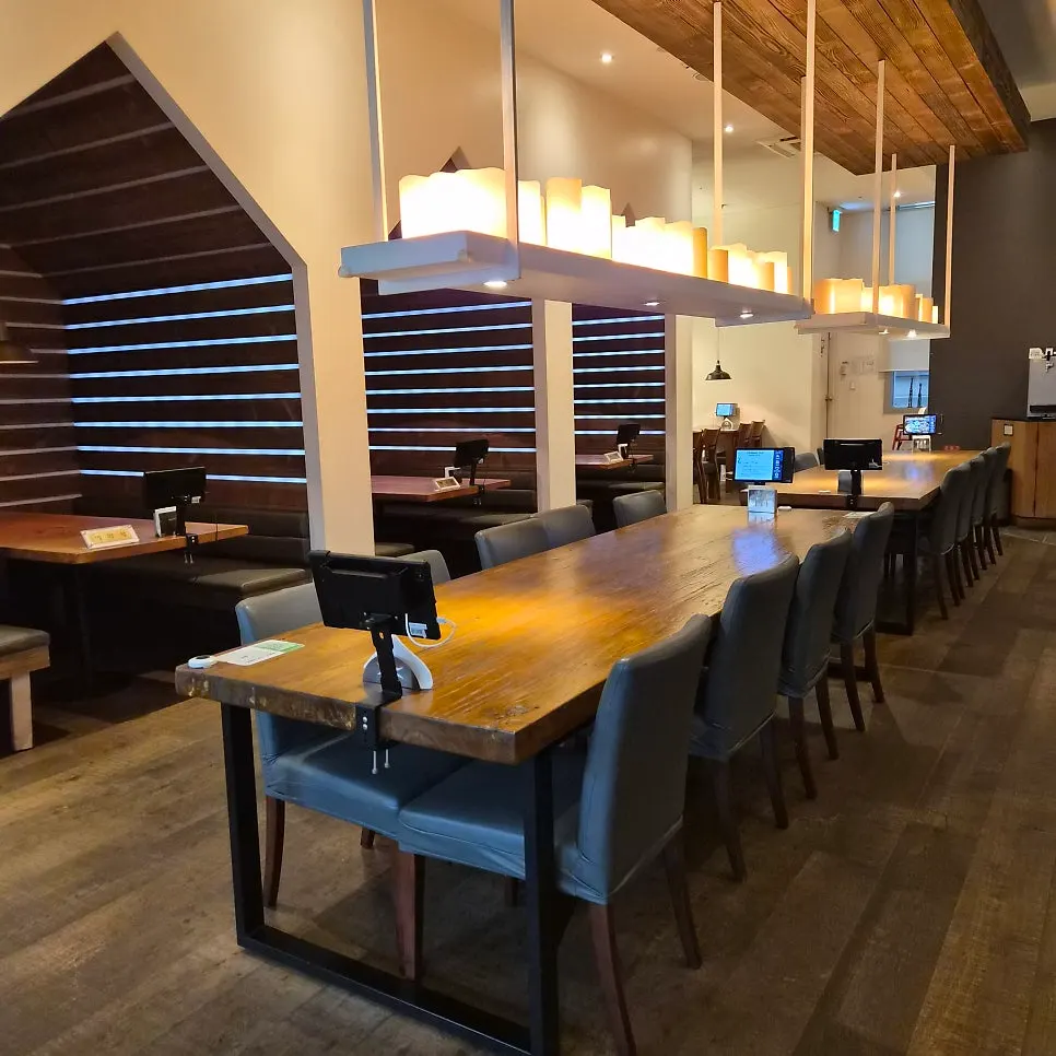 Dining hall seating under dim lighting