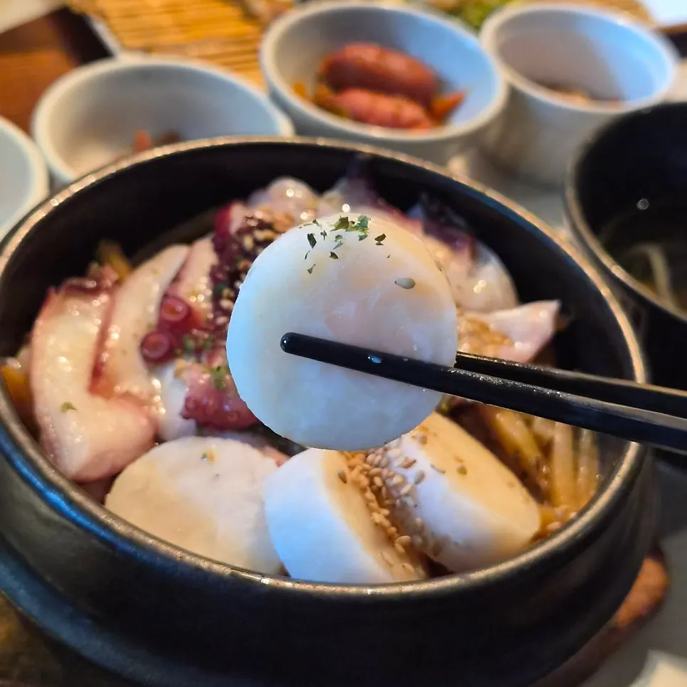 Potato and sauce inside the octopus scallop sotbap