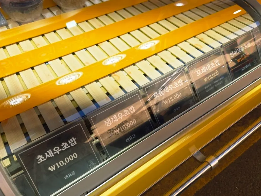 Individual sushi pieces on display