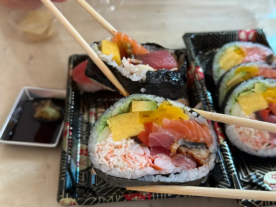 A single large slice of futomaki