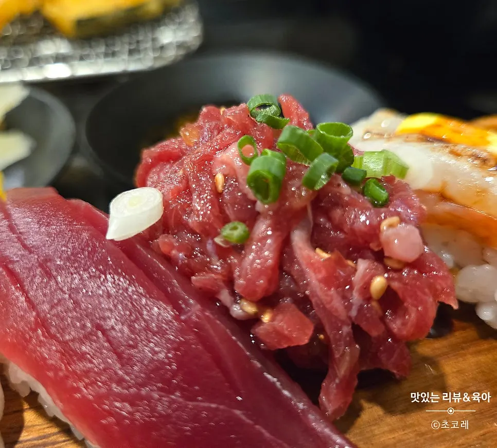 Thickly cut sashimi sushi including salmon