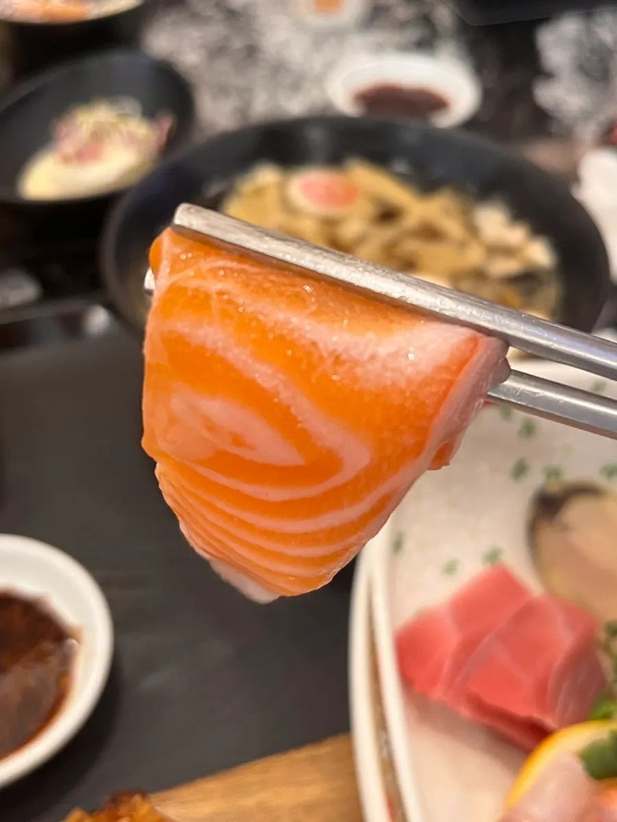 Assorted sashimi of salmon, tuna, and abalone