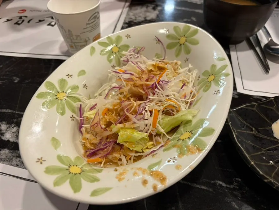 Complimentary salad served as a side dish