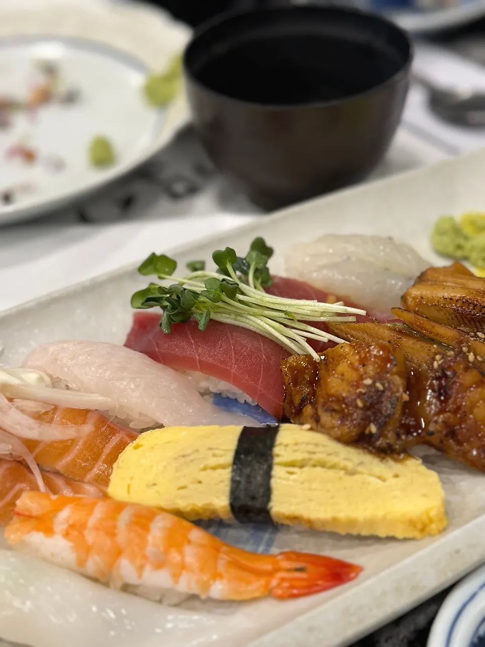 16-piece sushi plate with flounder, salmon, tuna, shrimp and eel