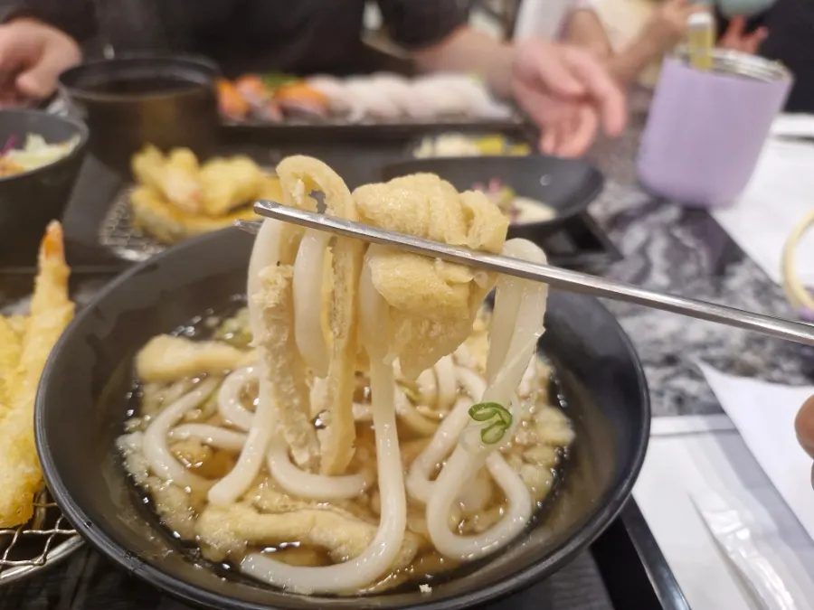 Mini udon with fried tofu pouch and shiitake mushrooms