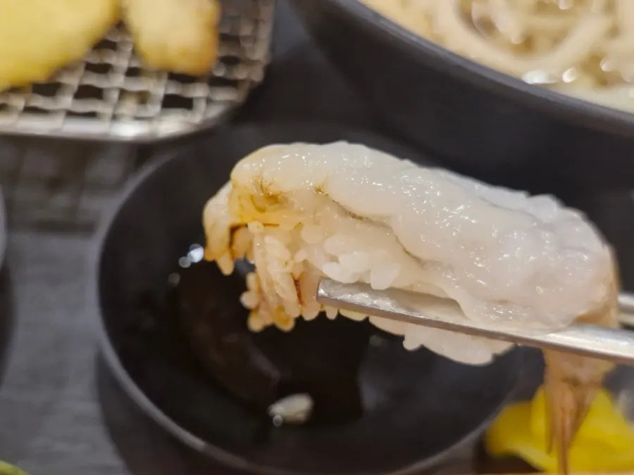 Picking up a piece of sushi