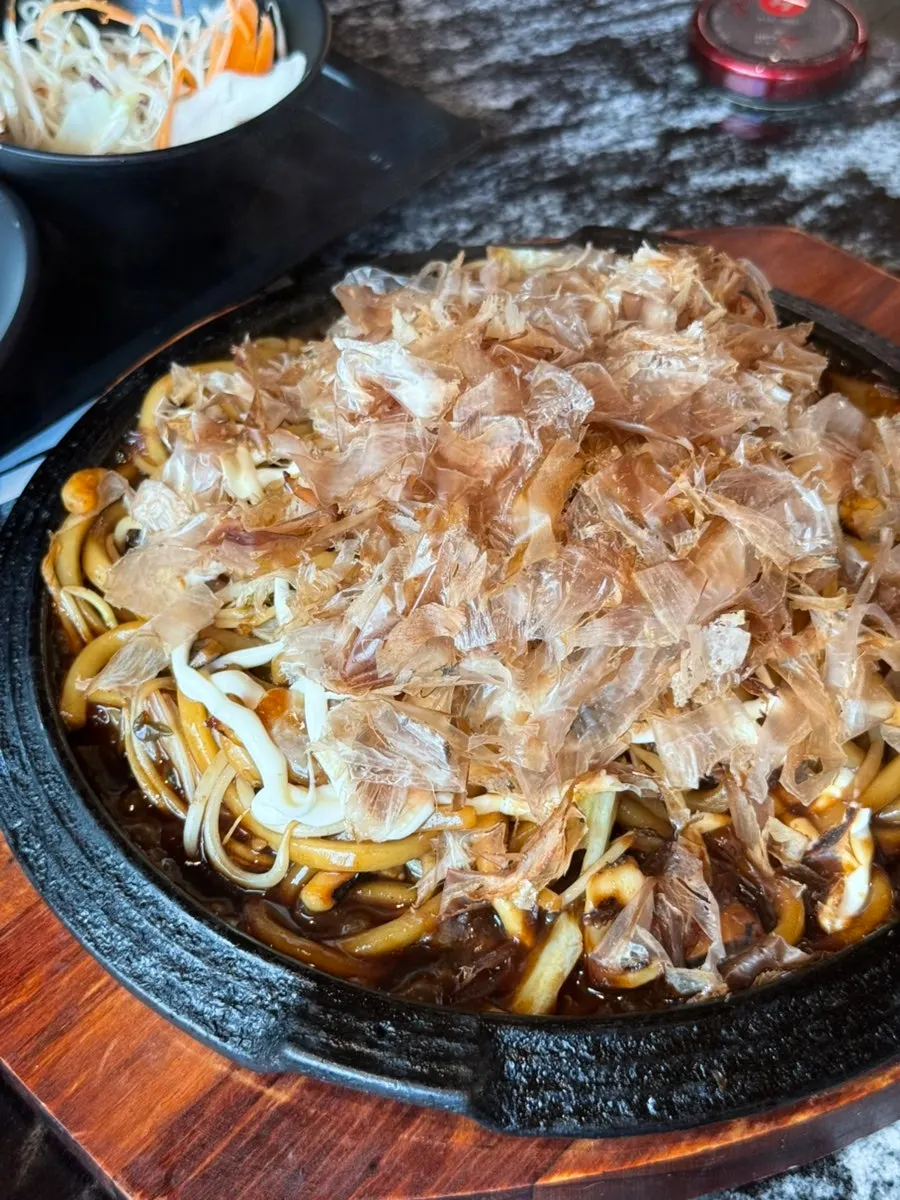 Seafood yaki udon served on a hot plate