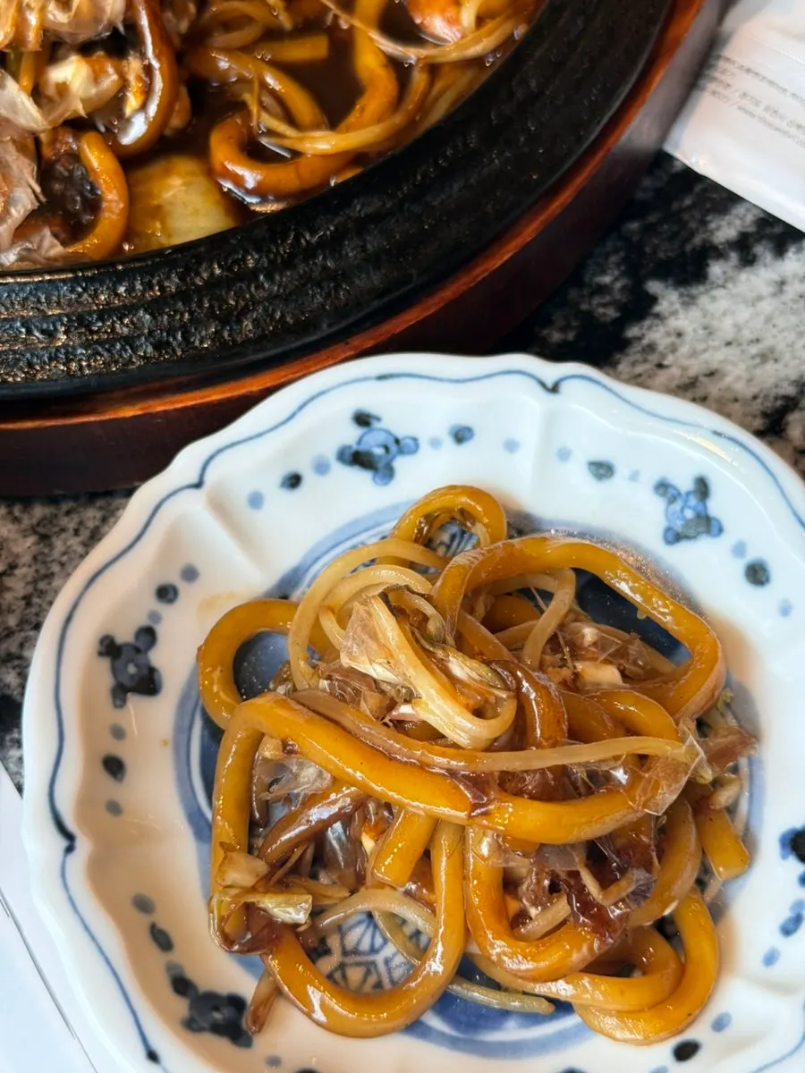Close-up of sizzling seafood yaki udon
