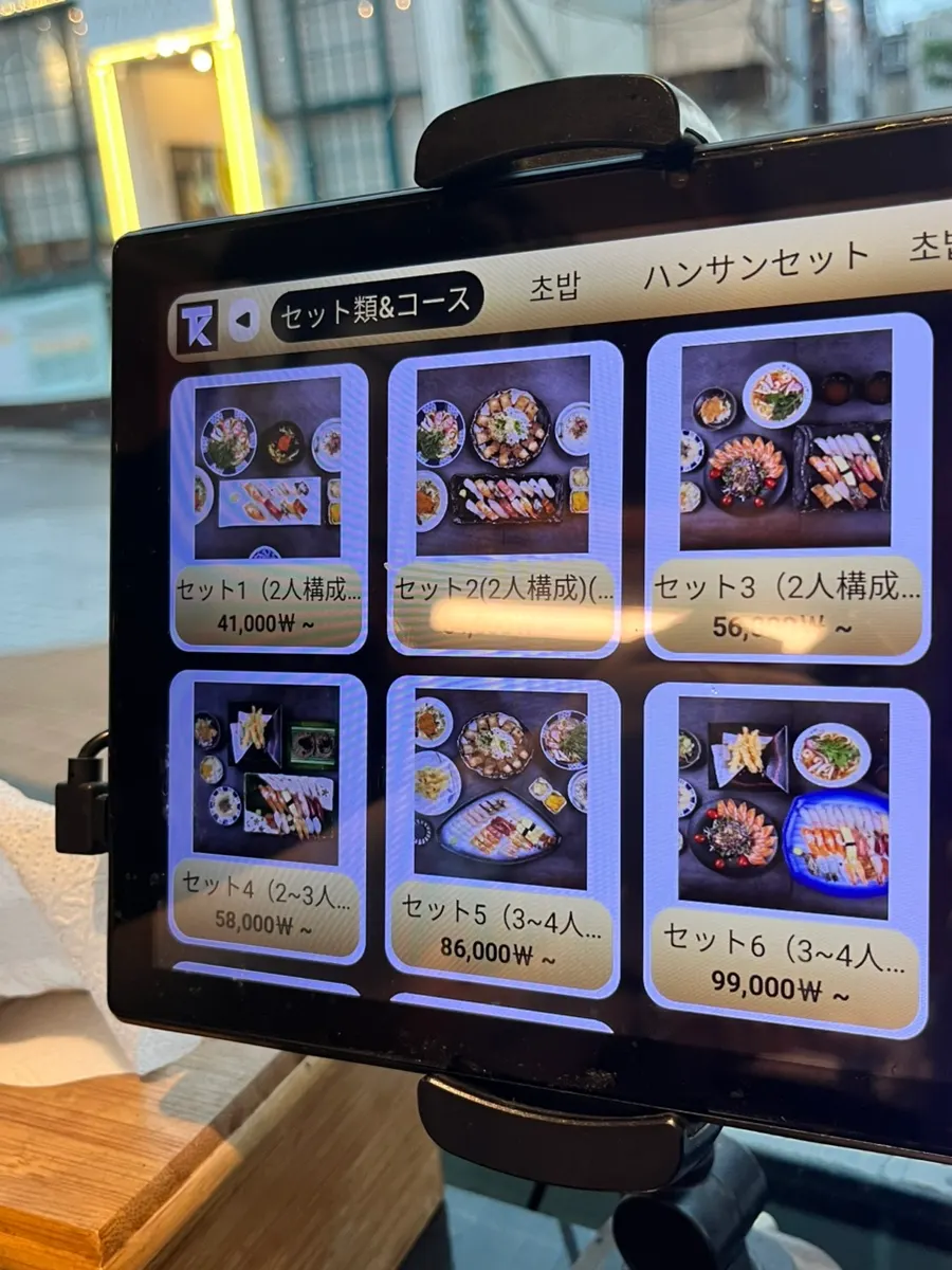 Screen showing salmon marinated rice bowl and fish roe rice bowl menus