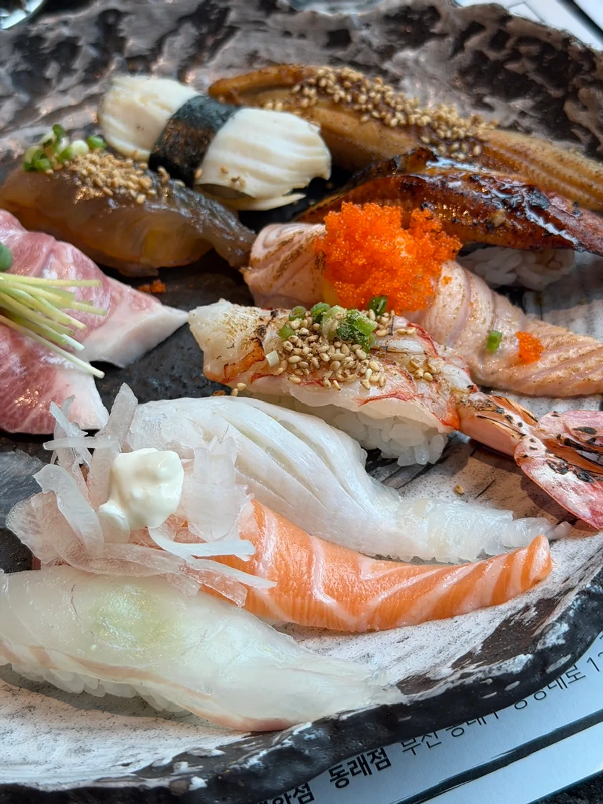 The omakase sushi set with 12 neatly arranged pieces of sushi