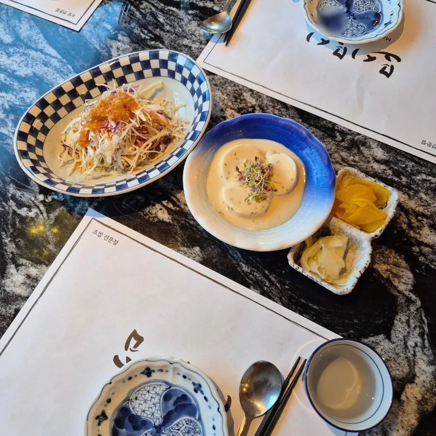 Full spread of white fish and salmon sushi