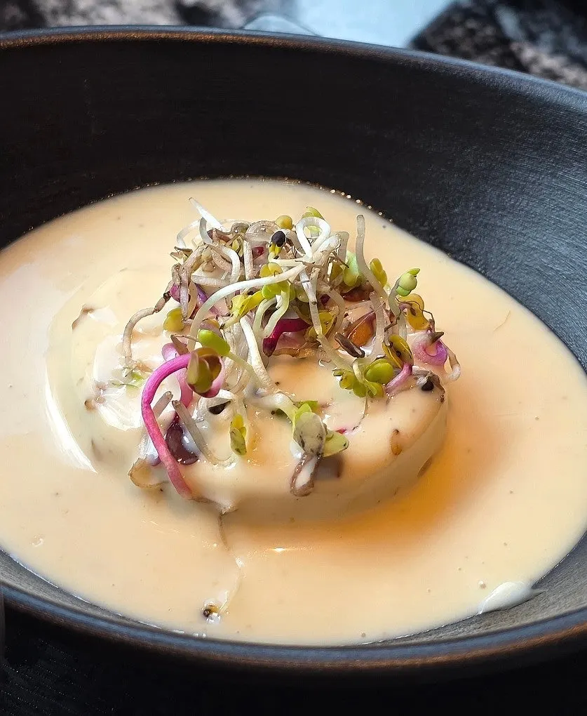 Silken tofu salad topped with sauce