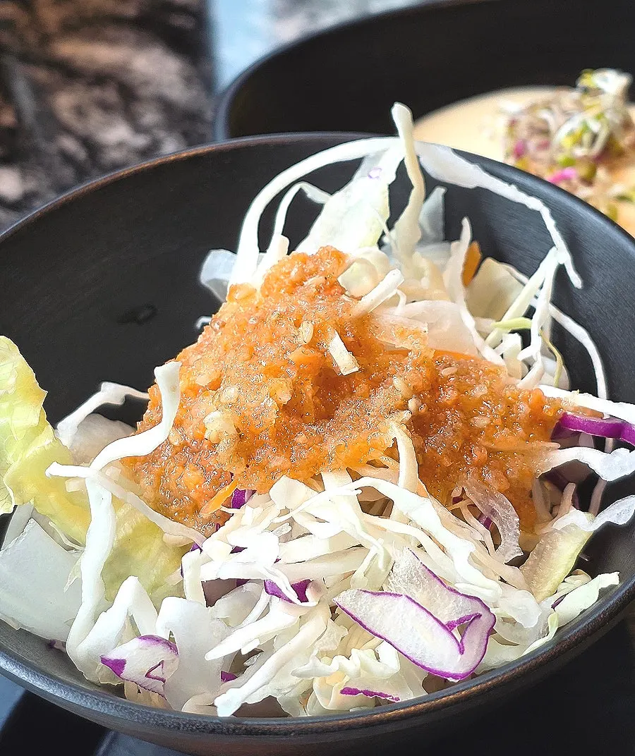 Vegetable salad drizzled with dressing