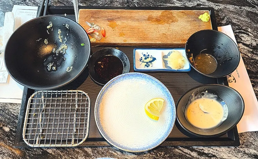 Table spread combining sushi and sashimi