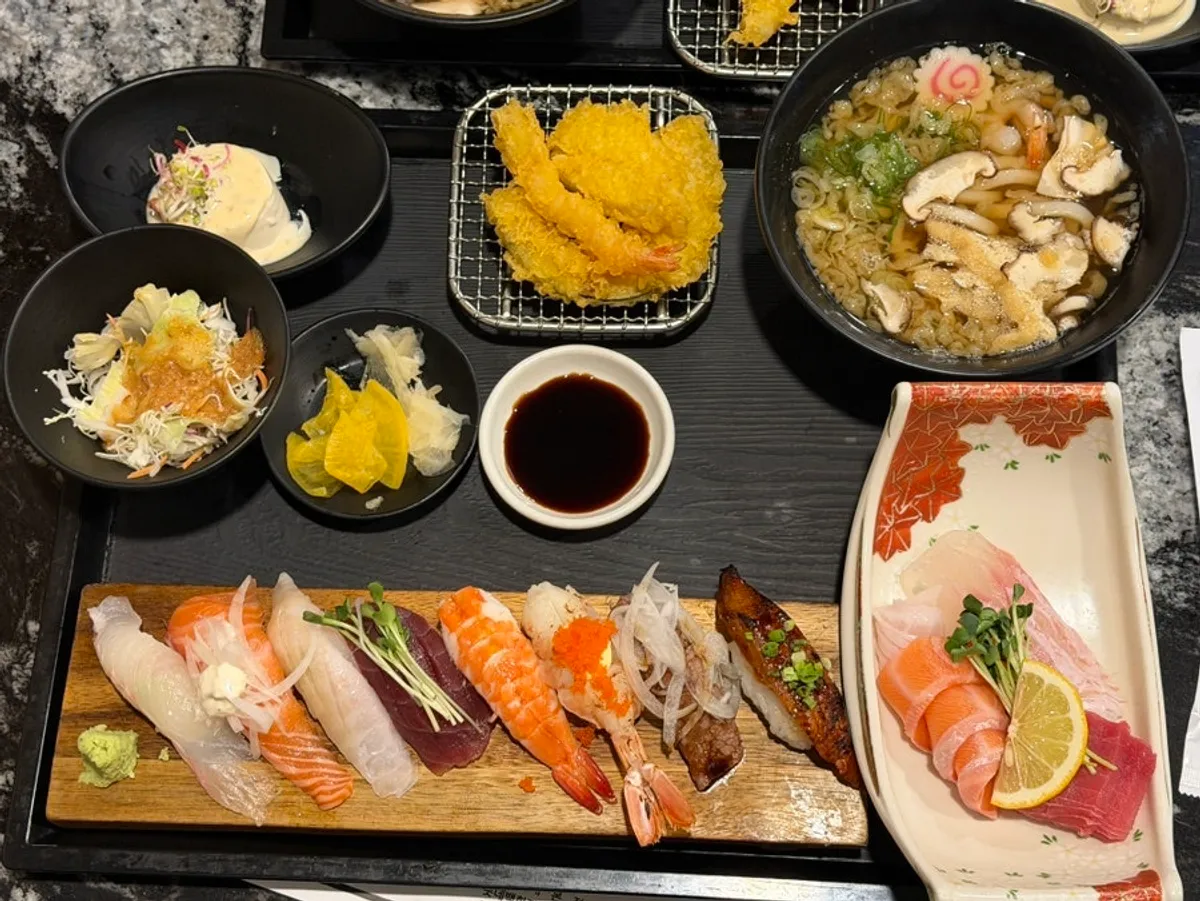 Hoehansang set with sushi, sashimi, udon, and tempura served together