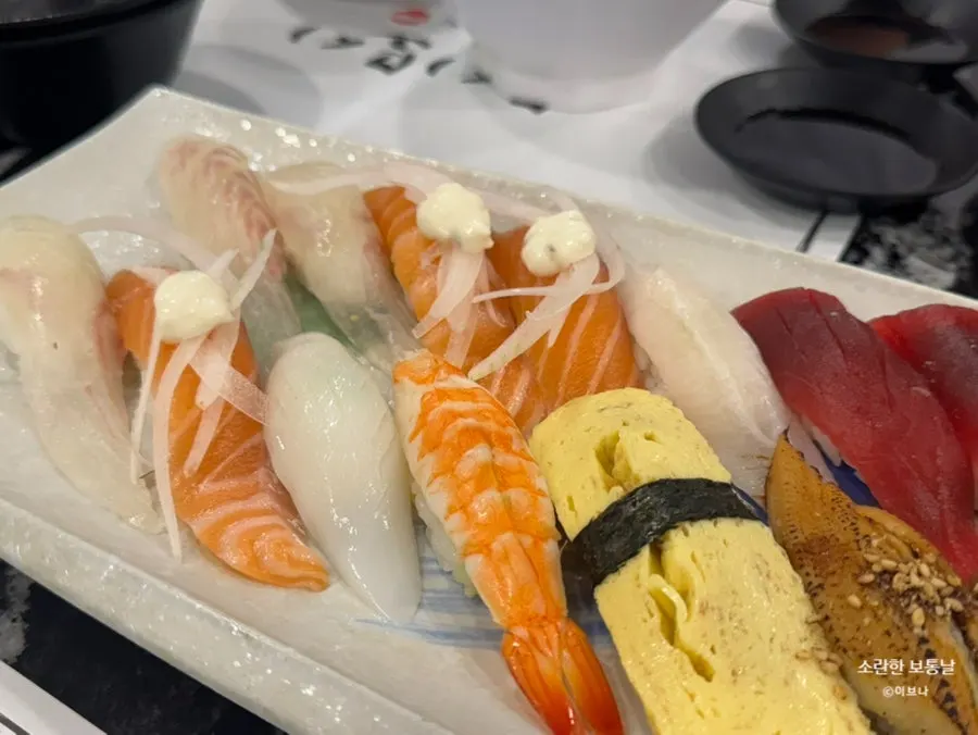 Plate of sushi including tuna and eel