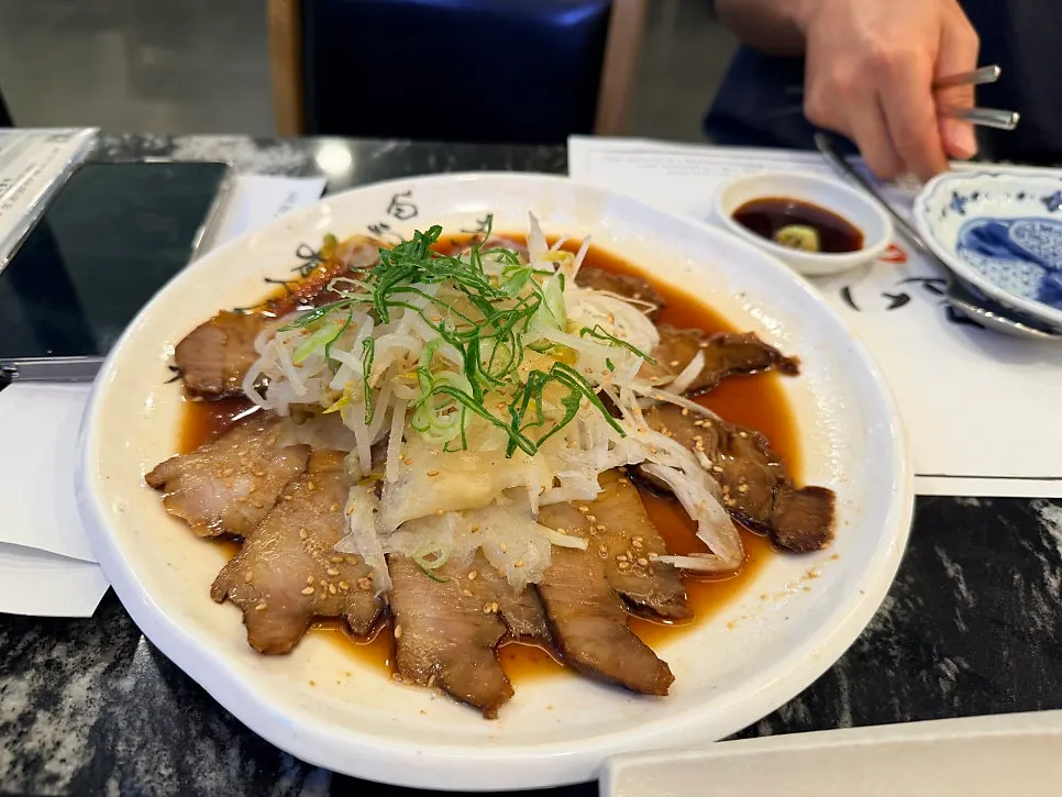 Full 2-person spread of sushi, chashu, and yaki udon