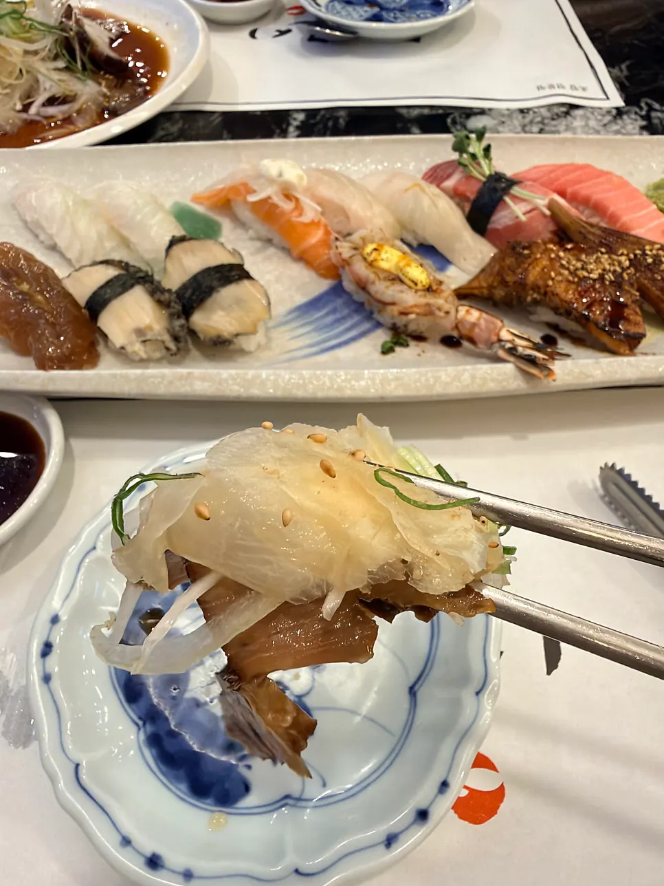Vertical photo of sushi at Moshi Moshi Sushi Dongnae Branch