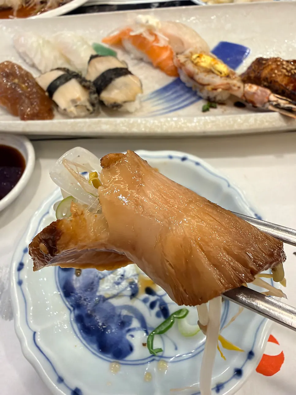 Vertical photo of a sushi plate at Moshi Moshi Sushi Dongnae Branch
