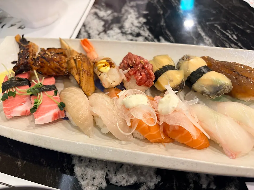 Plate of Moshi Moshi Sushi with thick cuts of fish