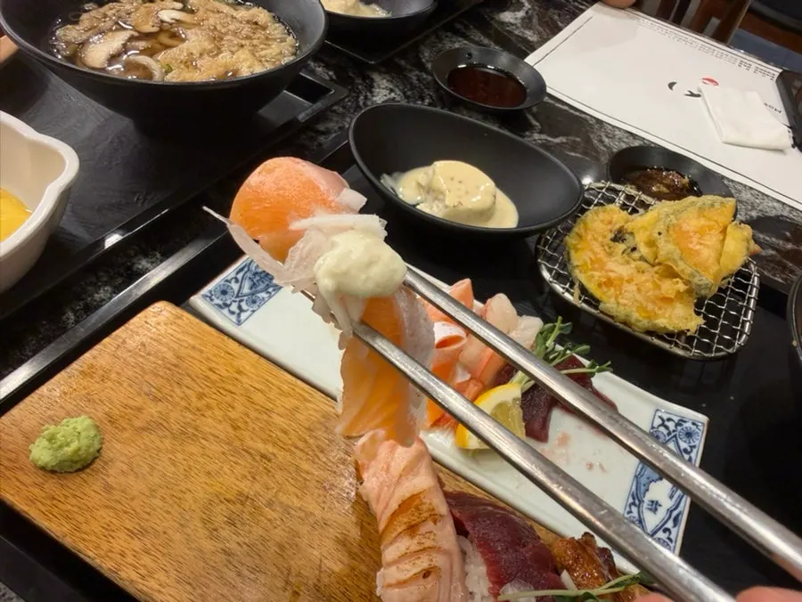 Sushi topped with fish longer than the rice underneath