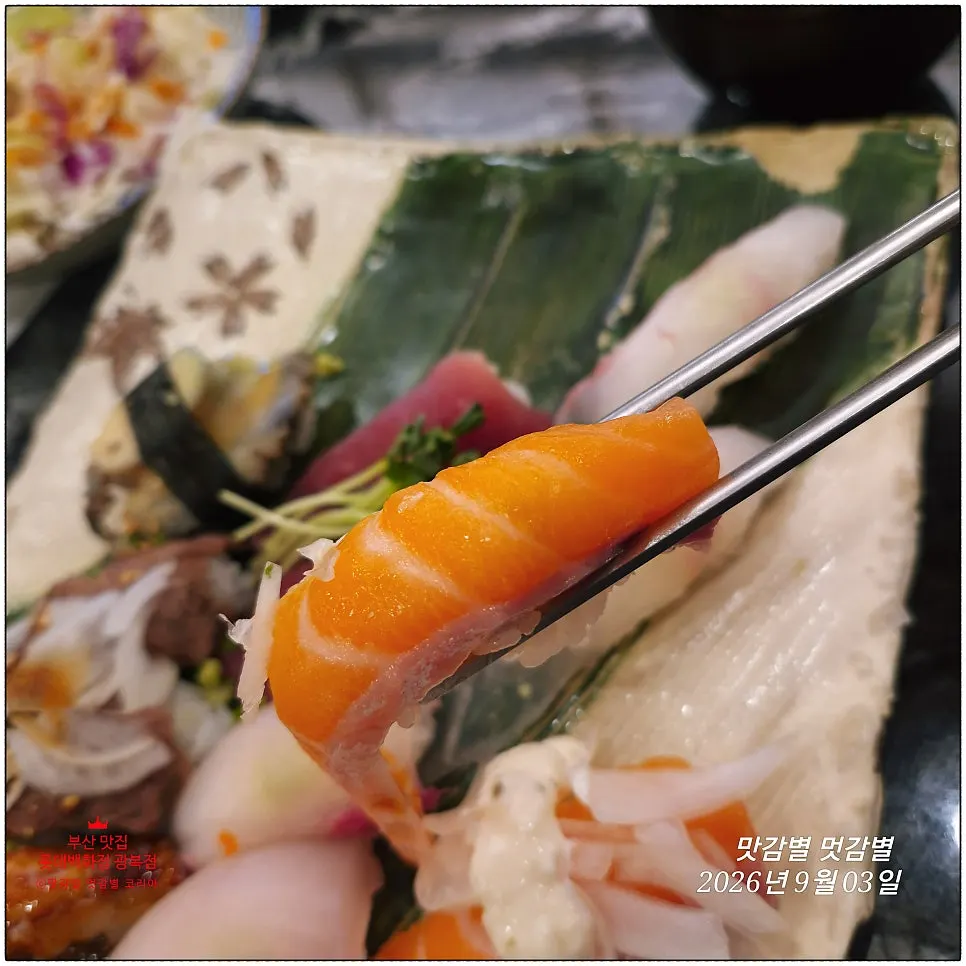 White fish sushi topped with a thick cut of fish