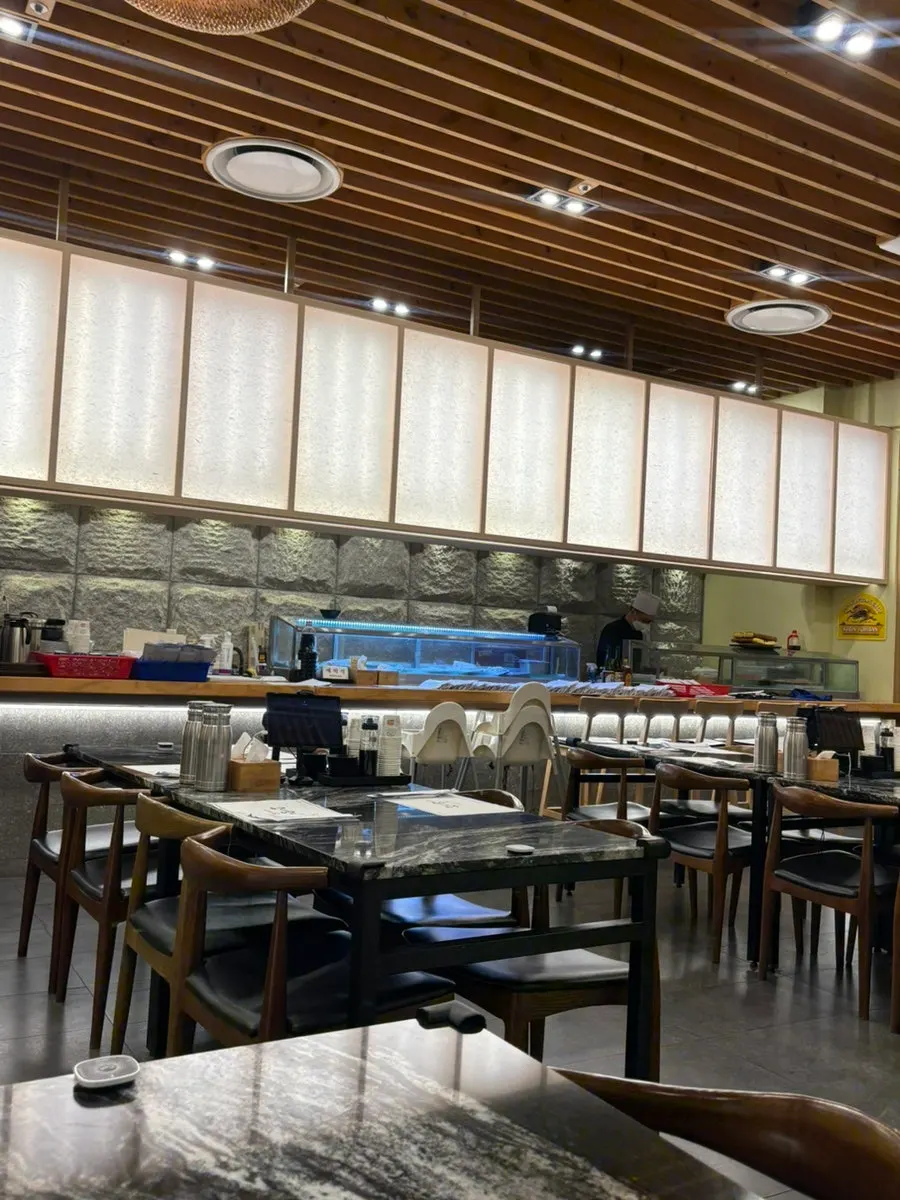 Spacious, clean interior of Moshi Moshi Sushi Gwangbok