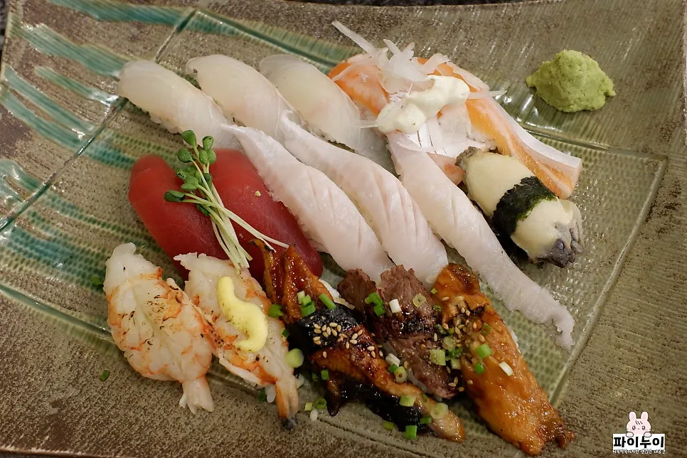 Plate of the 16-piece sushi upgraded to premium