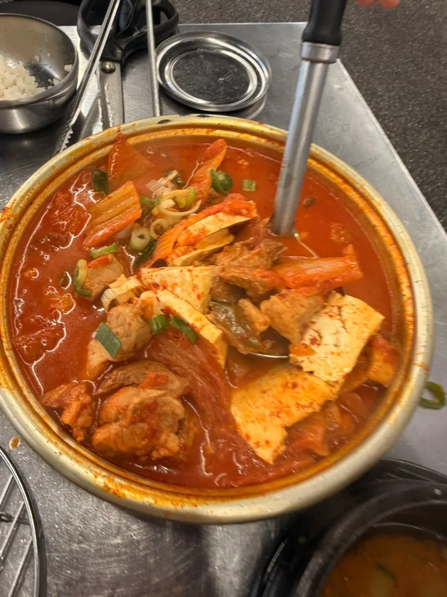 Inside of the kimchi stew packed with pork
