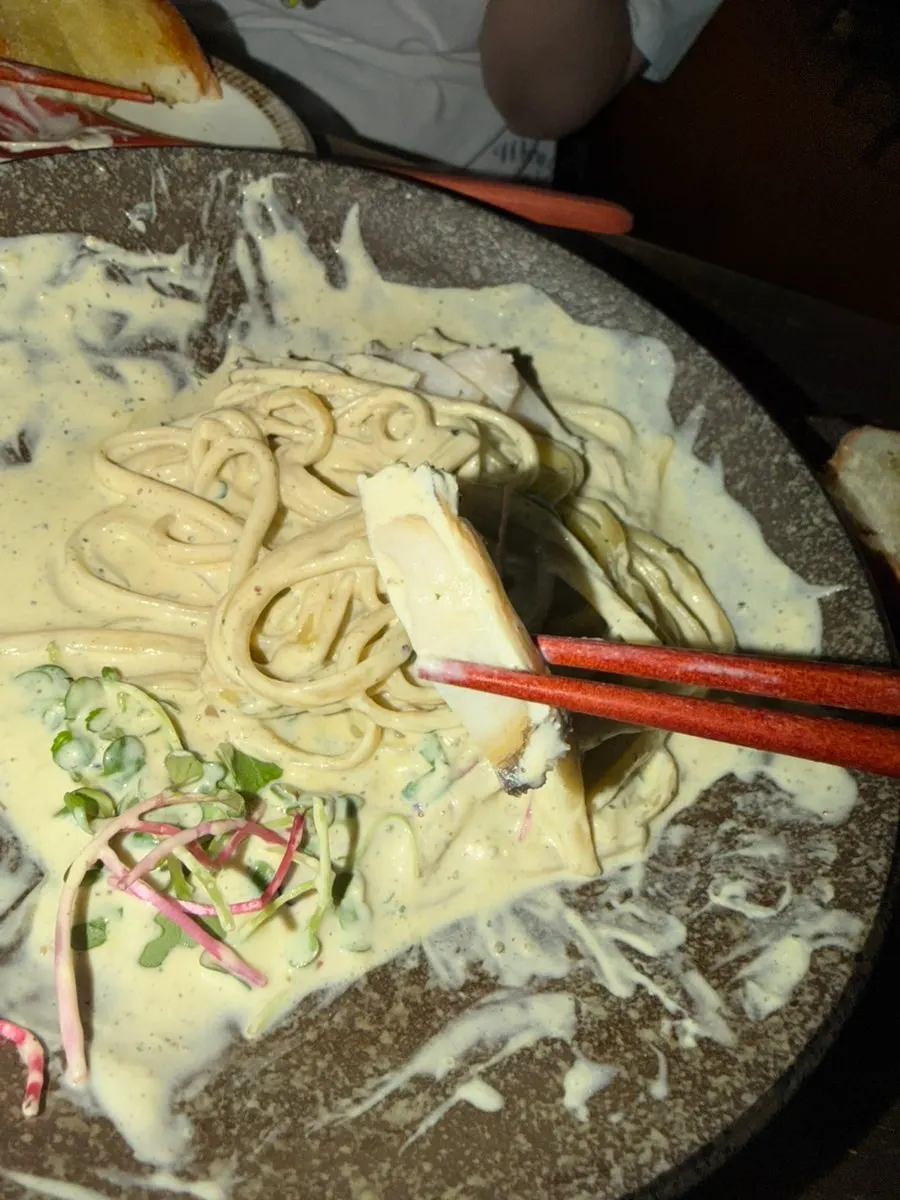 Extra baguette for dipping into the cream pasta sauce