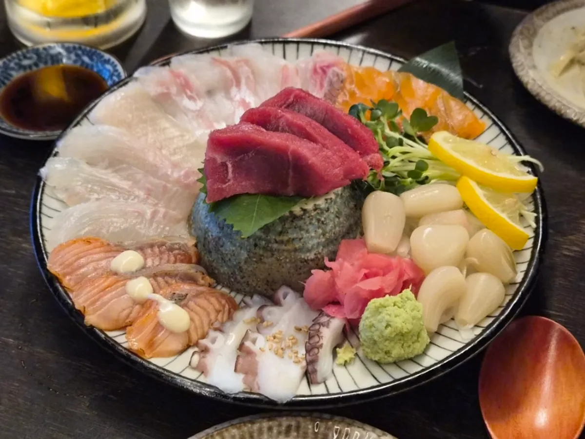 Table for two with moriawase and pasta at Motokurashi