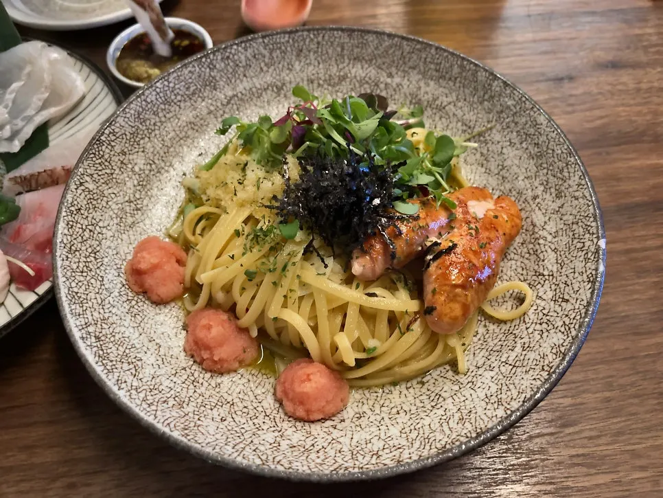 A plate of mentaiko flying fish roe pasta at Motokurashi
