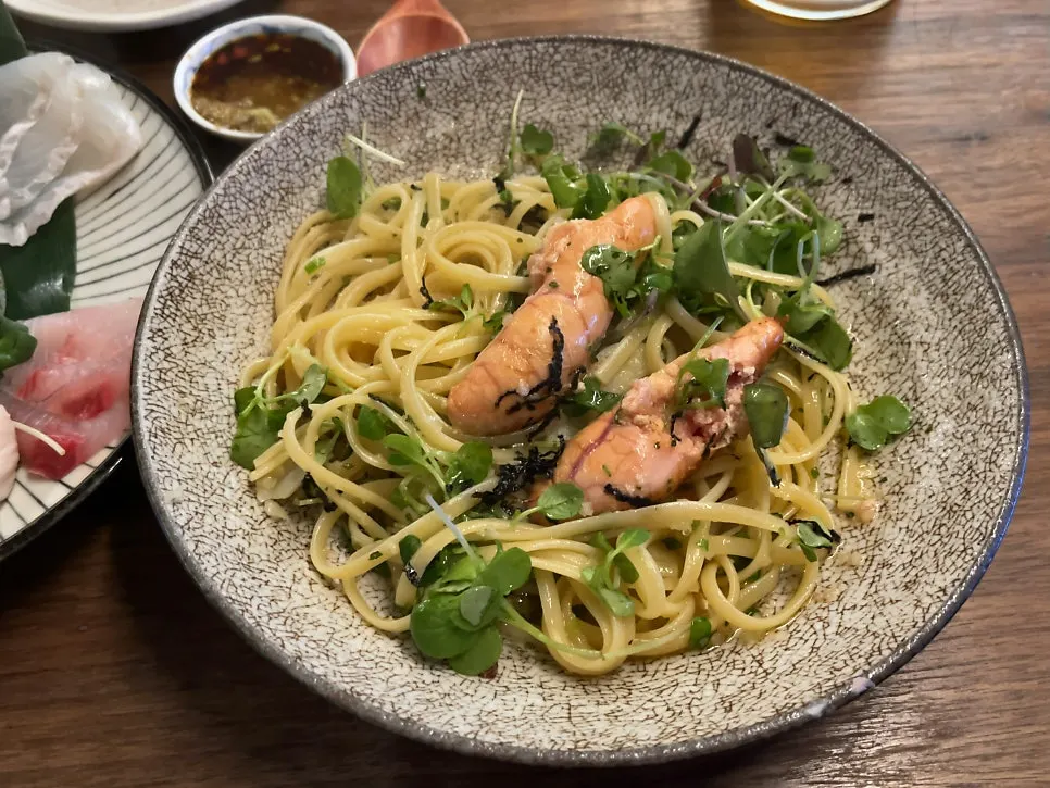 Noodles twirled on a fork from the mentaiko pasta