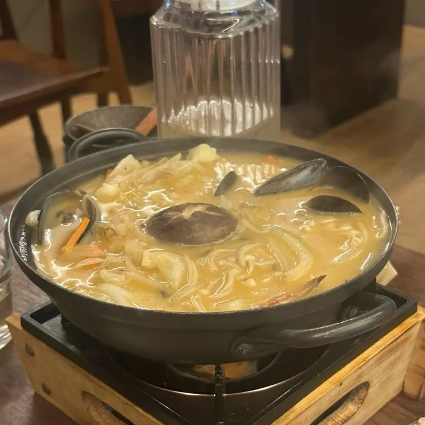 Drinking table set with food and beer together